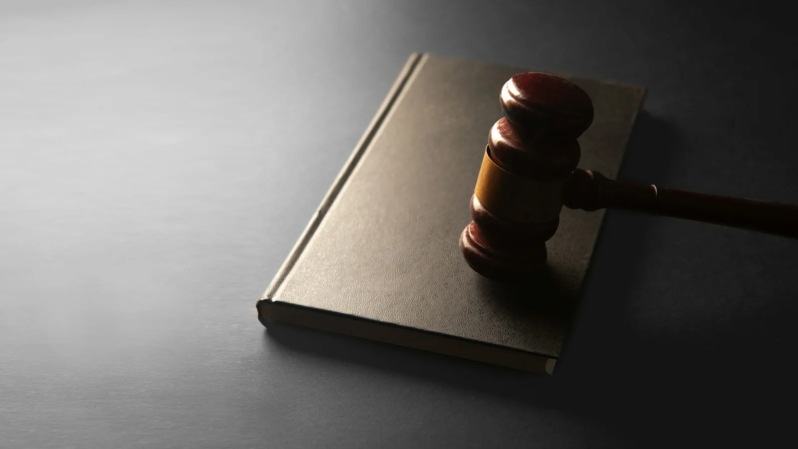 Judge's gavel resting on a law book during a California custody jurisdiction review