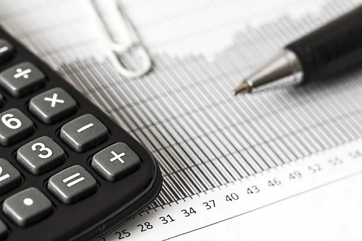 Calculator and financial records prepared for review